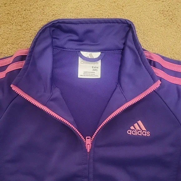 Kids purple adidas jacket with pink stripes. - Picture 2 of 7